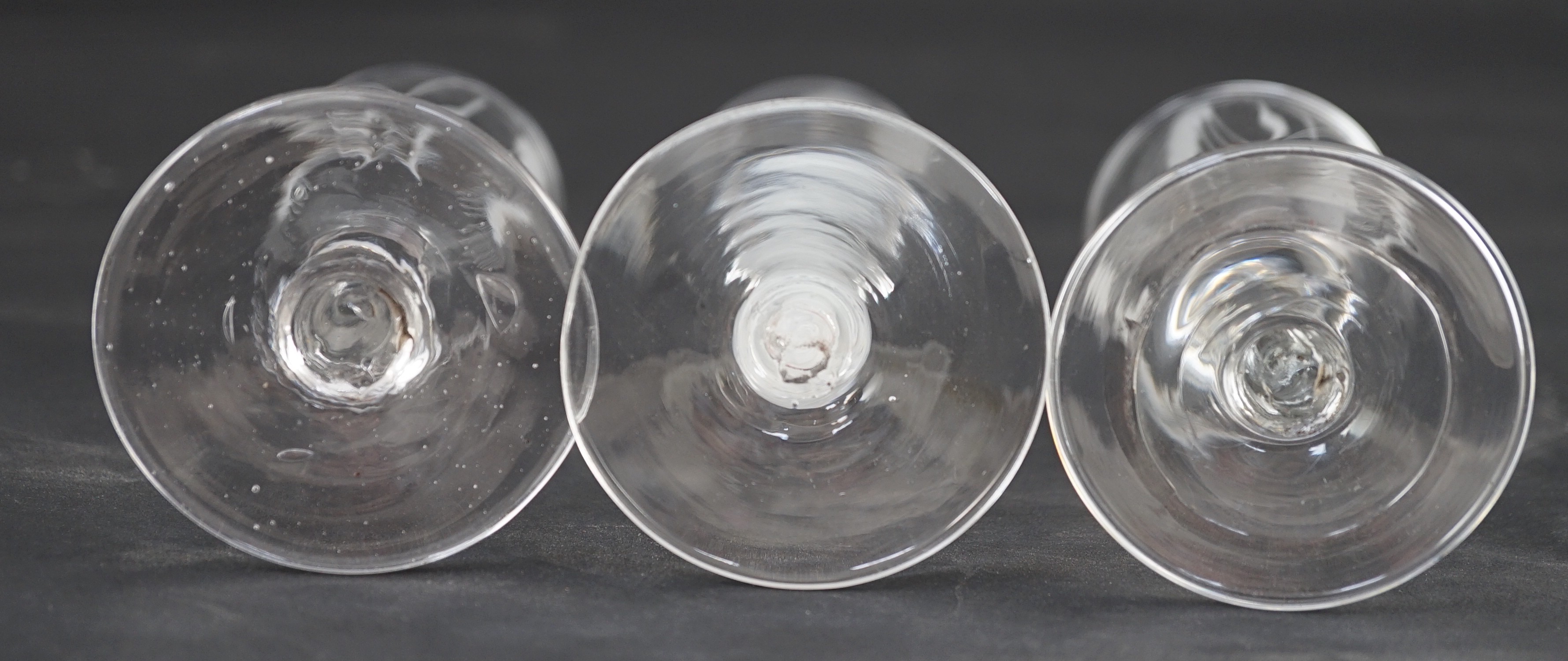 Three ‘hops and barley’ wheel engraved glass ale flutes, mid 18th century
